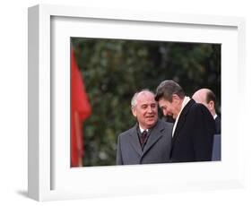 U.S. President Ronald Reagan, Right, Talks with Soviet Leader Mikhail Gorbachev-null-Framed Photographic Print