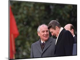 U.S. President Ronald Reagan, Right, Talks with Soviet Leader Mikhail Gorbachev-null-Mounted Photographic Print