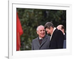 U.S. President Ronald Reagan, Right, Talks with Soviet Leader Mikhail Gorbachev-null-Framed Photographic Print