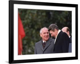 U.S. President Ronald Reagan, Right, Talks with Soviet Leader Mikhail Gorbachev-null-Framed Photographic Print