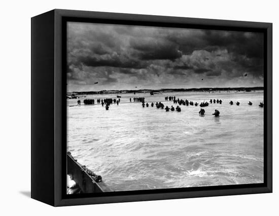 U.S. Reinforcements Wade Through the Surf as They Land at Normandy-null-Framed Stretched Canvas