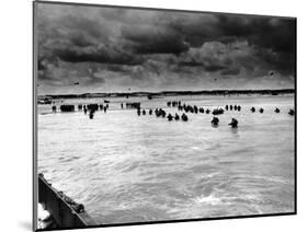 U.S. Reinforcements Wade Through the Surf as They Land at Normandy-null-Mounted Photographic Print