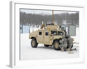 U.S. Soldiers Take Cover Behind a Humvee During Combat Support Training Exercises-Stocktrek Images-Framed Photographic Print