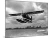 U.S. Water Ski Champion Bruce Parker Being Towed by a Seaplane across Biscayne Bay, 1946-null-Mounted Photographic Print