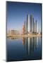 UAE, Abu Dhabi. Downtown waterfront skyscrapers.-Walter Bibikow-Mounted Photographic Print