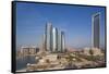 UAE, Abu Dhabi. Downtown waterfront skyscrapers.-Walter Bibikow-Framed Stretched Canvas