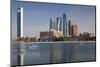 UAE, Abu Dhabi. Downtown waterfront skyscrapers.-Walter Bibikow-Mounted Photographic Print