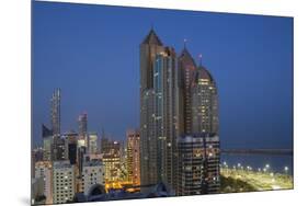 UAE, Abu Dhabi. Elevated skyline from Corniche Road East-Walter Bibikow-Mounted Premium Photographic Print