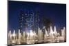 UAE, Abu Dhabi, Emirates Palace Hotel fountains and Etihad Towers, dusk-Walter Bibikw-Mounted Photographic Print