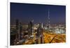 UAE, Downtown Dubai. Cityscape with Burj Khalifa at night.-Walter Bibikow-Framed Premium Photographic Print