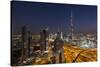 UAE, Downtown Dubai. Cityscape with Burj Khalifa at night.-Walter Bibikow-Stretched Canvas