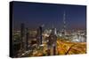 UAE, Downtown Dubai. Cityscape with Burj Khalifa at night.-Walter Bibikow-Stretched Canvas