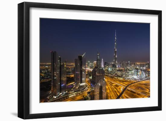 UAE, Downtown Dubai. Cityscape with Burj Khalifa at night.-Walter Bibikow-Framed Photographic Print