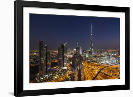 UAE, Downtown Dubai. Cityscape with Burj Khalifa at night.-Walter Bibikow-Framed Photographic Print