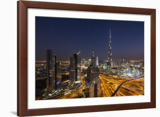 UAE, Downtown Dubai. Cityscape with Burj Khalifa at night.-Walter Bibikow-Framed Photographic Print