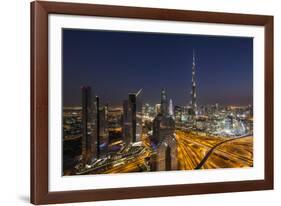 UAE, Downtown Dubai. Cityscape with Burj Khalifa at night.-Walter Bibikow-Framed Photographic Print