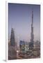 UAE, Downtown Dubai. Cityscape with Burj Khalifa at night.-Walter Bibikow-Framed Premium Photographic Print