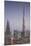 UAE, Downtown Dubai. Cityscape with Burj Khalifa at night.-Walter Bibikow-Mounted Premium Photographic Print