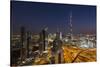 UAE, Downtown Dubai. Cityscape with Burj Khalifa at night.-Walter Bibikow-Stretched Canvas