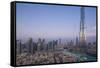 UAE, Downtown Dubai. Cityscape with Burj Khalifa.-Walter Bibikow-Framed Stretched Canvas