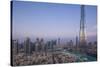 UAE, Downtown Dubai. Cityscape with Burj Khalifa.-Walter Bibikow-Stretched Canvas