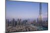 UAE, Downtown Dubai. Cityscape with Burj Khalifa.-Walter Bibikow-Mounted Photographic Print