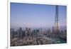 UAE, Downtown Dubai. Cityscape with Burj Khalifa.-Walter Bibikow-Framed Photographic Print