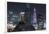 UAE, Downtown Dubai. Downtown cityscape at night lit in blue.-Walter Bibikow-Framed Photographic Print