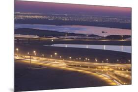 UAE, Downtown Dubai. Elevated desert and highway view.-Walter Bibikow-Mounted Premium Photographic Print