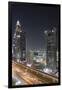 UAE, Downtown Dubai. High-rise buildings along Sheikh Zayed Road.-Walter Bibikow-Framed Premium Photographic Print