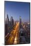 UAE, Downtown Dubai. High-rise buildings along Sheikh Zayed Road.-Walter Bibikow-Mounted Photographic Print