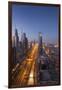 UAE, Downtown Dubai. High-rise buildings along Sheikh Zayed Road.-Walter Bibikow-Framed Premium Photographic Print