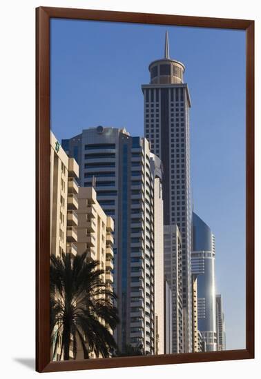 UAE, Downtown Dubai. High-rise buildings along Sheikh Zayed Road-Walter Bibikow-Framed Photographic Print