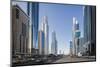 UAE, Downtown Dubai. High-rise buildings along Sheikh Zayed Road-Walter Bibikow-Mounted Photographic Print