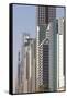 UAE, Downtown Dubai. High-rise buildings along Sheikh Zayed Road-Walter Bibikow-Framed Stretched Canvas