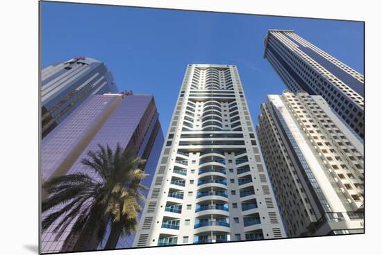 UAE, Downtown Dubai. High-rise buildings along Sheikh Zayed Road-Walter Bibikow-Mounted Photographic Print