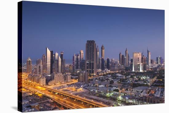 UAE, Downtown Dubai. Skyscrapers on Sheikh Zayed Road from downtown-Walter Bibikow-Stretched Canvas