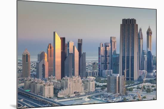 UAE, Downtown Dubai. Skyscrapers on Sheikh Zayed Road from downtown-Walter Bibikow-Mounted Photographic Print