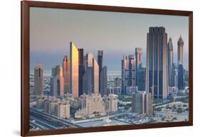 UAE, Downtown Dubai. Skyscrapers on Sheikh Zayed Road from downtown-Walter Bibikow-Framed Photographic Print