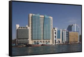 UAE, Dubai, Deira. waterfront buildings by Dubai Creek-Walter Bibikow-Framed Stretched Canvas