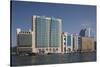 UAE, Dubai, Deira. waterfront buildings by Dubai Creek-Walter Bibikow-Stretched Canvas