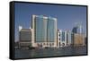 UAE, Dubai, Deira. waterfront buildings by Dubai Creek-Walter Bibikow-Framed Stretched Canvas