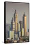 UAE, Dubai, Jumeirah. Skyscrapers seen from Jumeirah-Walter Bibikow-Framed Stretched Canvas