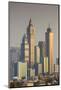 UAE, Dubai, Jumeirah. Skyscrapers seen from Jumeirah-Walter Bibikow-Mounted Photographic Print