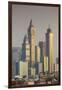 UAE, Dubai, Jumeirah. Skyscrapers seen from Jumeirah-Walter Bibikow-Framed Premium Photographic Print