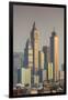 UAE, Dubai, Jumeirah. Skyscrapers seen from Jumeirah-Walter Bibikow-Framed Premium Photographic Print