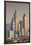 UAE, Dubai, Jumeirah. Skyscrapers seen from Jumeirah-Walter Bibikow-Framed Photographic Print