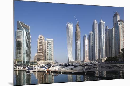 UAE, Dubai Marina high-rise buildings including the twisted Cayan Tower-Walter Bibikow-Mounted Photographic Print