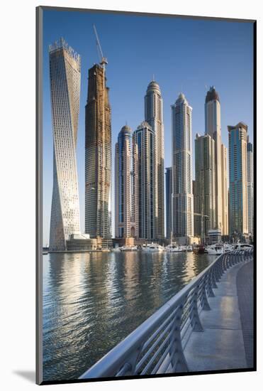 UAE, Dubai Marina high-rise buildings including the twisted Cayan Tower-Walter Bibikow-Mounted Photographic Print