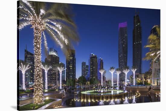 UAE, Dubai Marina high-rise buildings including the twisted Cayan Tower-Walter Bibikow-Stretched Canvas